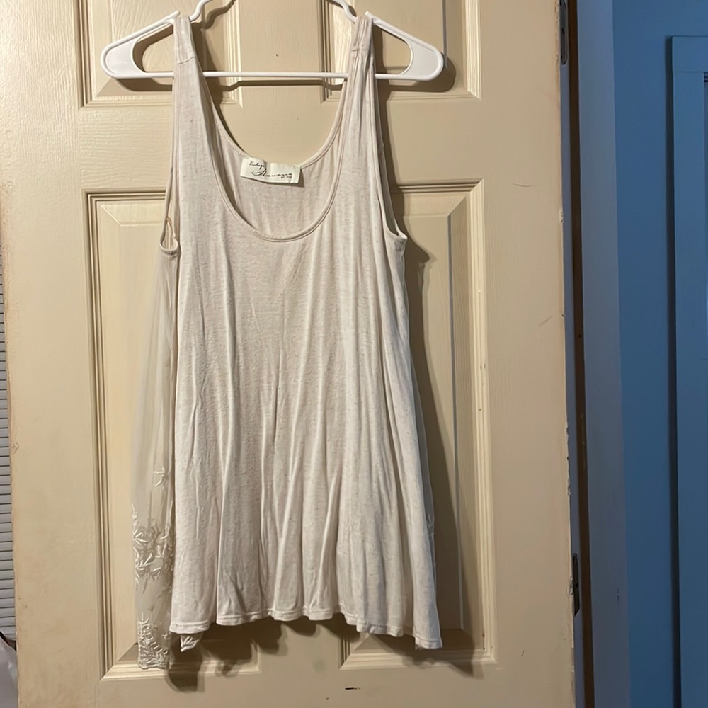 Off-white tank top, with lace/shear sides